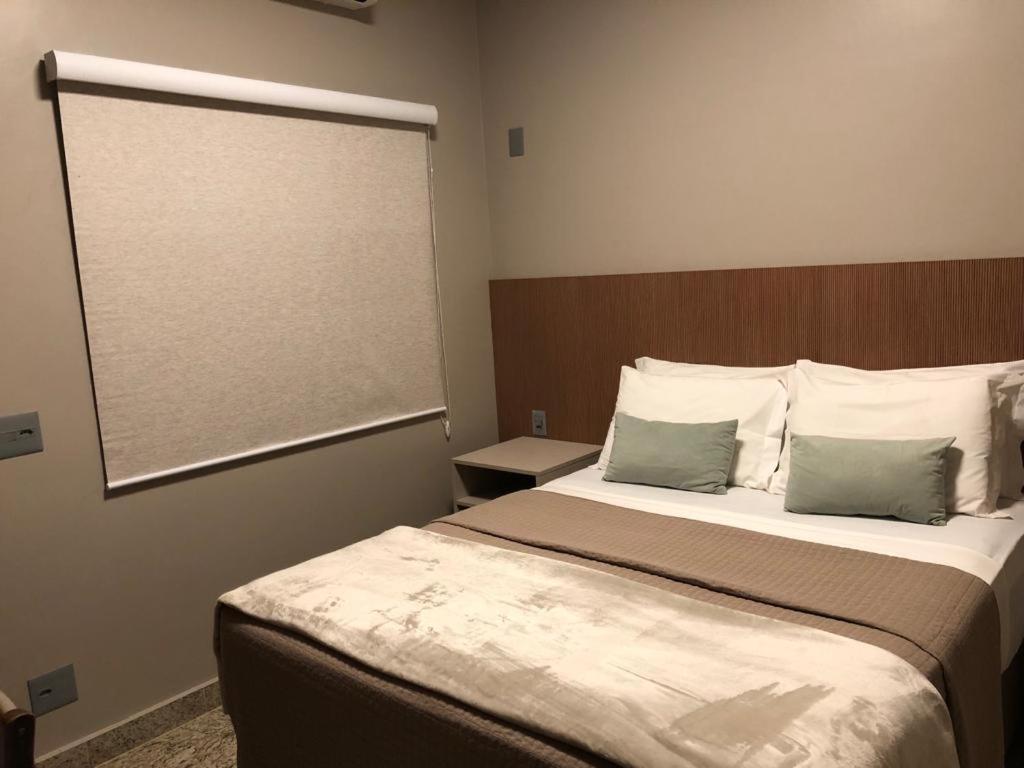 Hotel Pousada Santa Rita ฮิเบเราเปรโต ภายนอก รูปภาพ